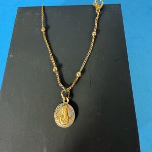pendant-medallion with the image of the Virgin Mary 10k